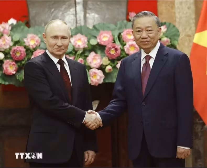 苏林主席和普京总统。（图片来源：越通社）
