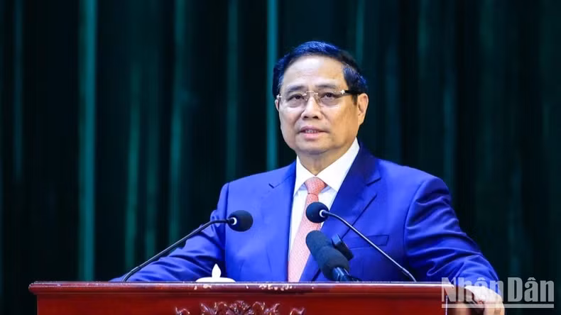 范明正总理在会上发表讲话。 范明正总理在会上发表讲话。