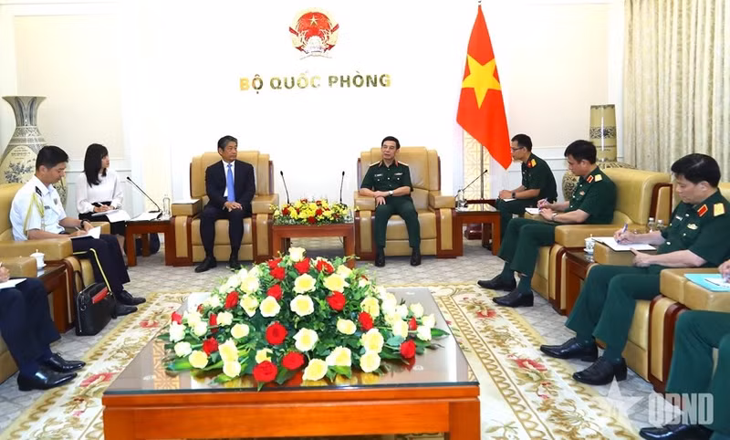 会见场景。（图片来源：qdnd.vn）