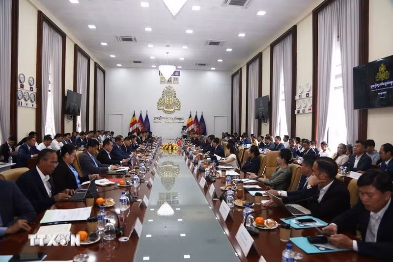 在柬越南企业与柬埔寨发展理事会对话会场景。（图片来源：越通社）